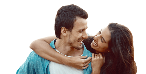 smiling couple happy with their dental insurance