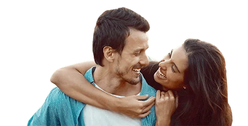smiling couple happy with their dental insurance